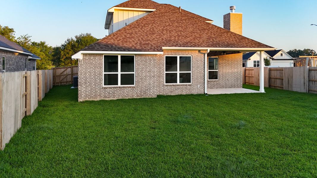 Exterior details and patio area of a home in Mission Ranch, College Station (Image 27).