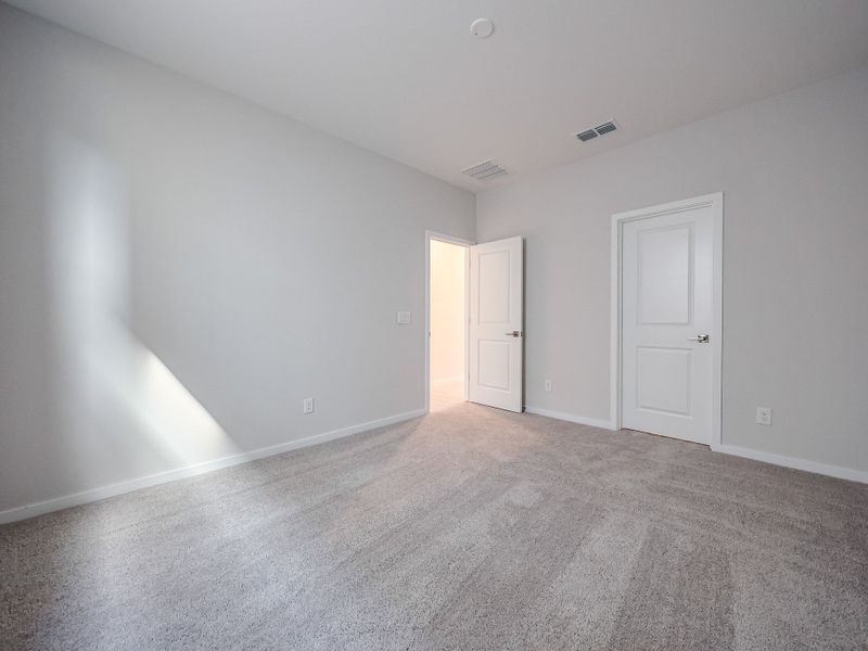 A room with white doors.