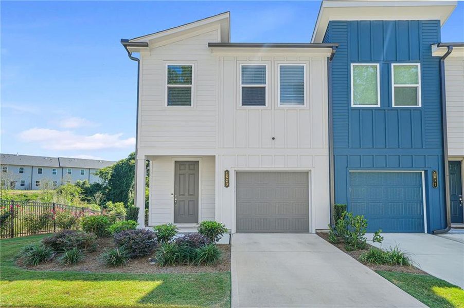 Front exterior of a new home in , Atlanta, GA, highlighting curb appeal (Image 1).