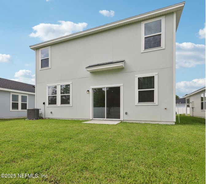 Front exterior of a new home in Kings Crossing, Jacksonville, FL, highlighting curb appeal (Image 23). Front exterior of a new home in Kings Crossing, Jacksonville, FL, highlighting curb appeal (Image 23).