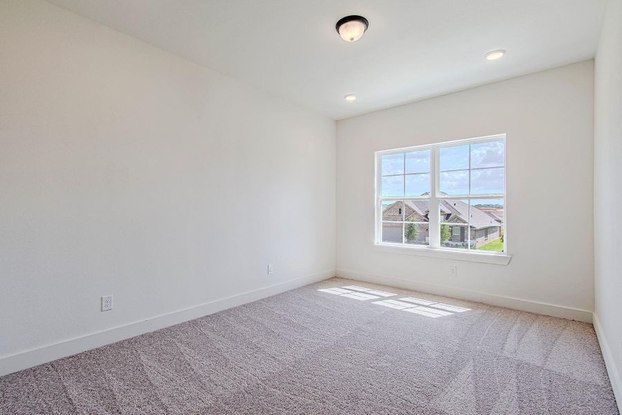 Bright secondary bedroom with ample closet space