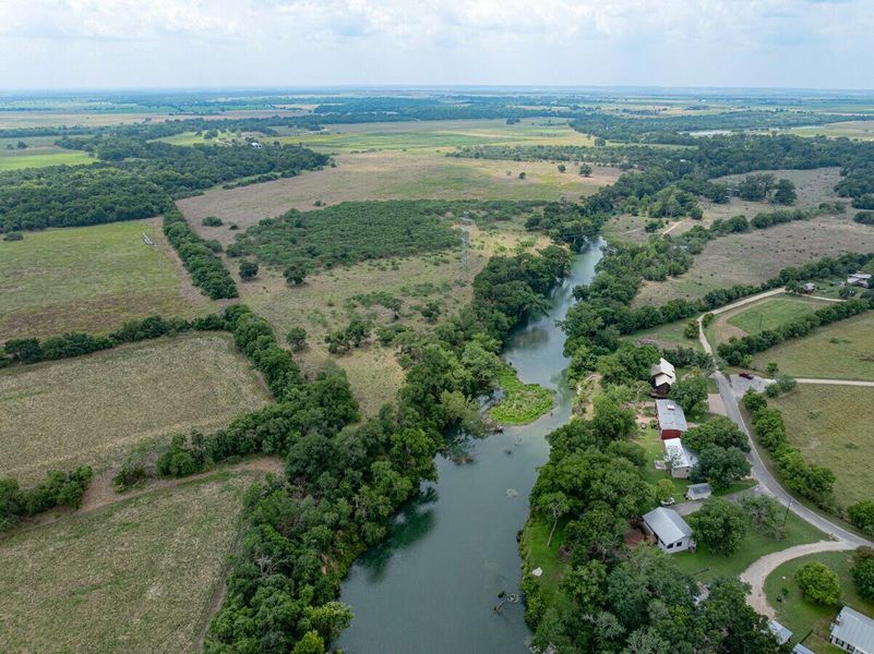 View of rural area with a nearby body of water