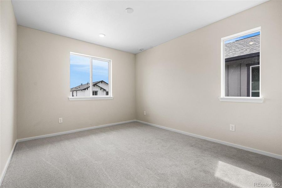 Spacious, unfurnished interior of a new home in Barefoot Village, Firestone (Image 29).