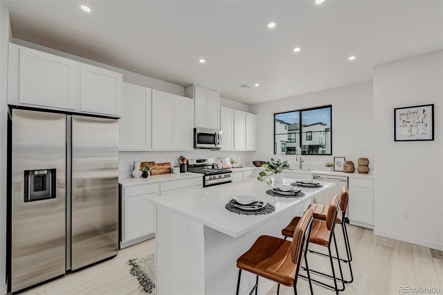Furnished interior view inside a new home in The Hub at Virginia Village, Denver (Image 7). Furnished interior view inside a new home in The Hub at Virginia Village, Denver (Image 7).