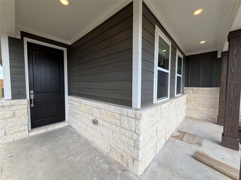 Exterior details and patio area of a home in Willow Springs, Buda (Image 2).
