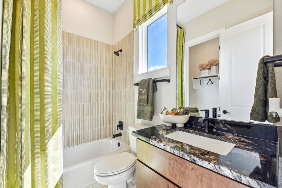 Representative furnished interior of a home built from the Enfield by Taylor Morrison in Village Grove, Dripping Springs (Image 34).