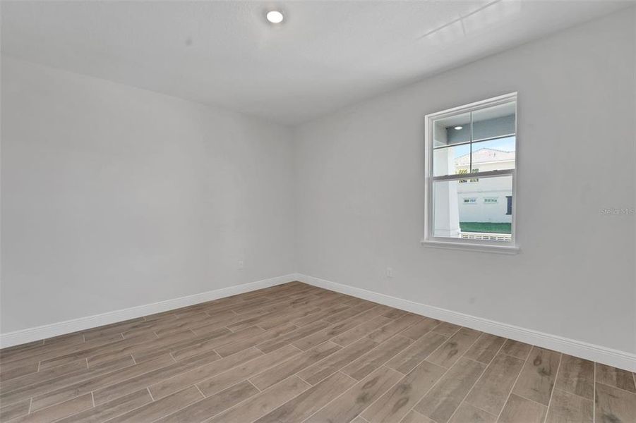 Spacious, unfurnished interior of a new home in Palms at Windermere, Windermere (Image 45).