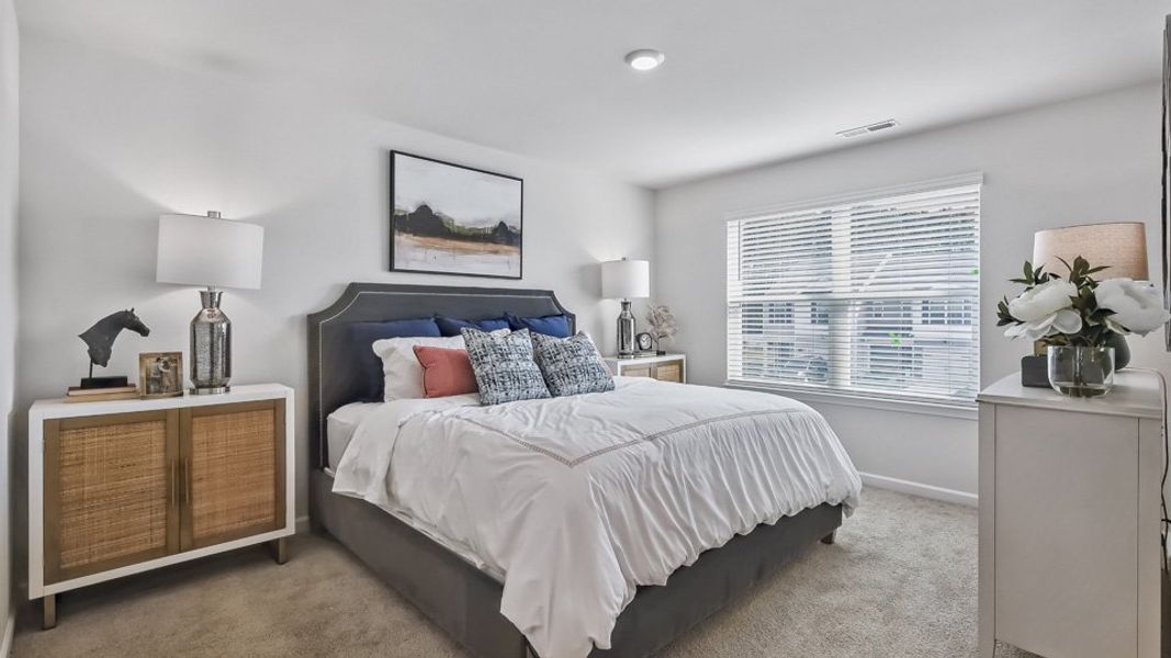 Furnished interior view inside a new home in The Townes at Honeycutt Oaks, Angier (Image 9). Furnished interior view inside a new home in The Townes at Honeycutt Oaks, Angier (Image 9).