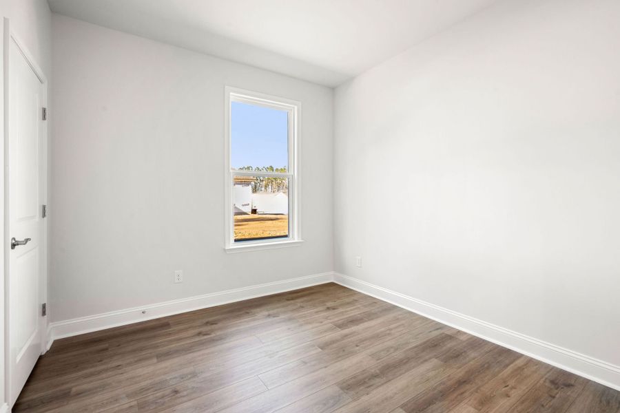 Spacious, unfurnished interior of a new home in Sun City Hilton Head, Bluffton (Image 13).