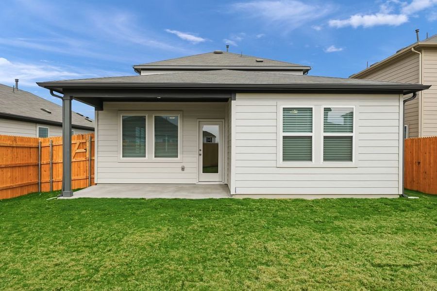 Exterior details and patio area of a home in Longview 40s, Del Valle (Image 14).