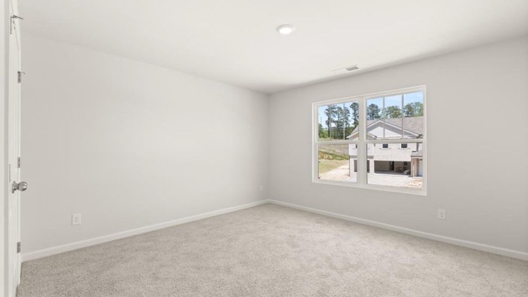 Spacious, unfurnished interior of a new home in Northwoods at Mirror Lake, Villa Rica (Image 28).