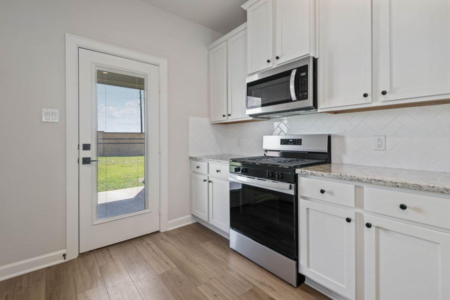Furnished interior view inside a new home in Emberly, Beasley (Image 5).