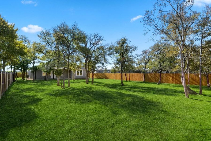 Virtually modified View of fenced backyard