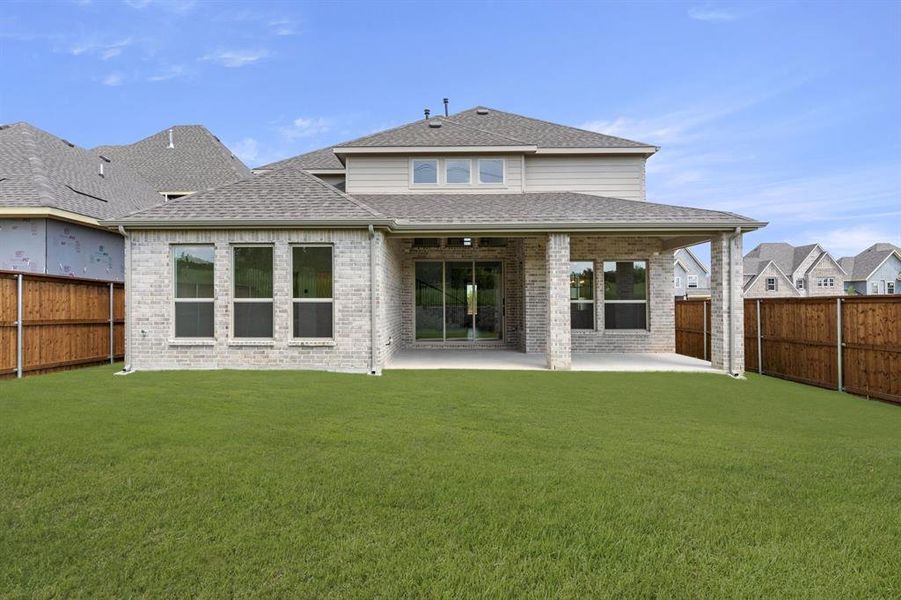 Exterior details and patio area of a home in Inspiration, Seis Lagos (Image 3). Exterior details and patio area of a home in Inspiration, Seis Lagos (Image 3).