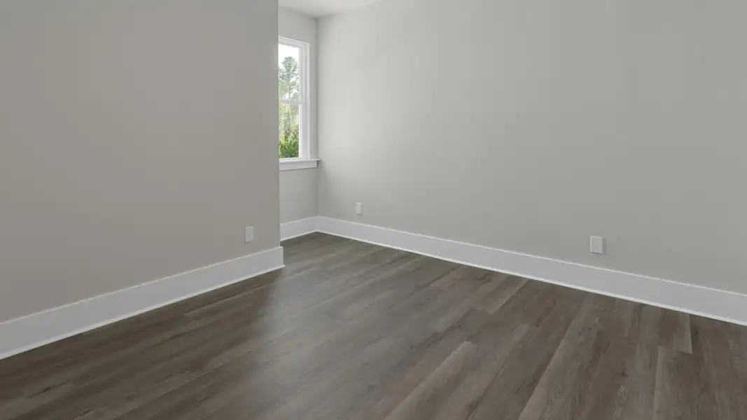 Spacious, unfurnished interior of a new home in The Retreat at Indigo Preserve Townhomes, Leland (Image 23).