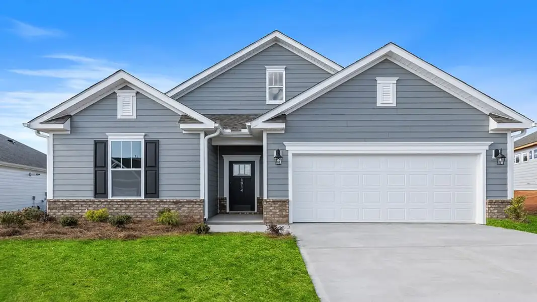 Front exterior of a new home in The Villas at Pine Valley, Boiling Springs, SC, highlighting curb appeal (Image 1).