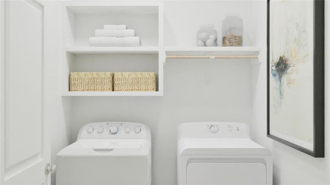 Washroom featuring washing machine and clothes dryer Washroom featuring washing machine and clothes dryer