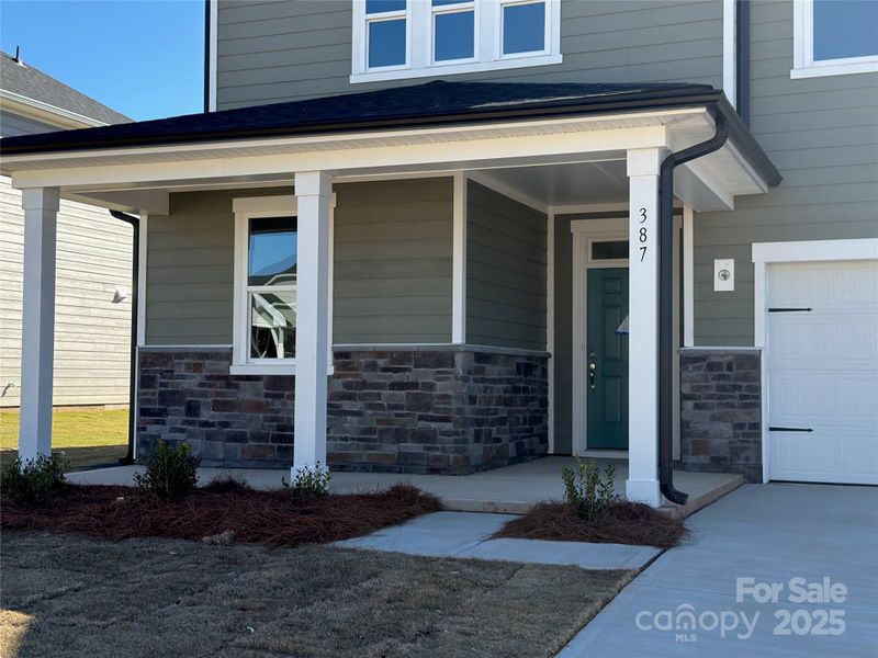 Exterior details and patio area of a home in Bella Vista Heritage, Denver (Image 3).