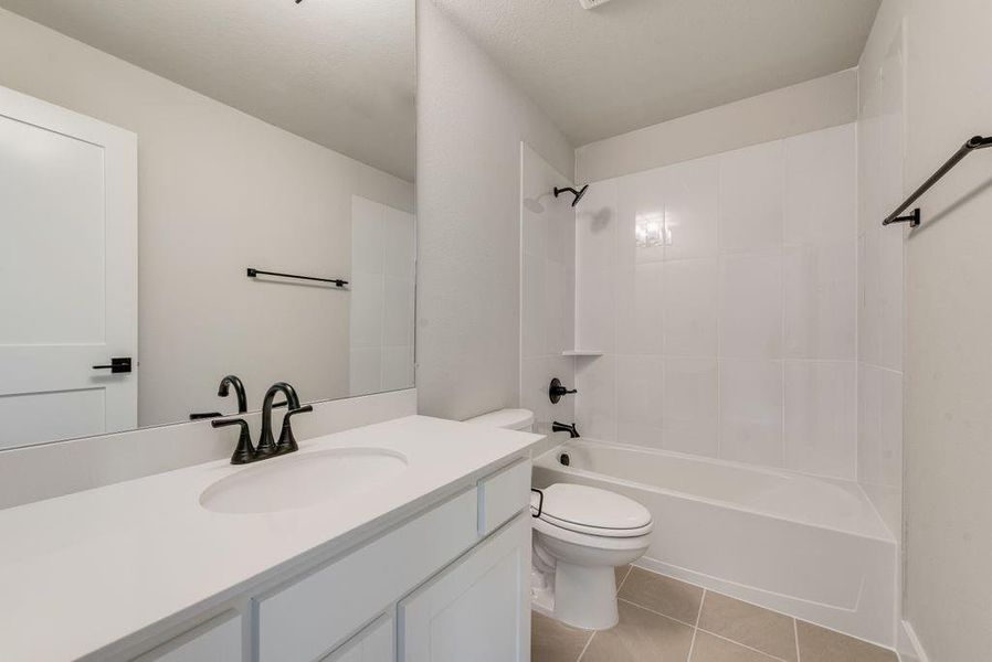 Furnished interior view inside a new home in Trails at Cottonwood Creek, Fate (Image 4).