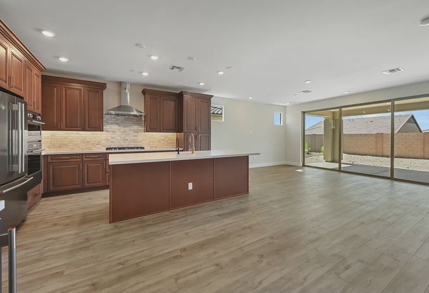 Trilogy Ridgecrest Flourish HS 132 Kitchen Great Room - 3 of 13 Trilogy Ridgecrest Flourish HS 132 Kitchen Great Room - 3 of 13