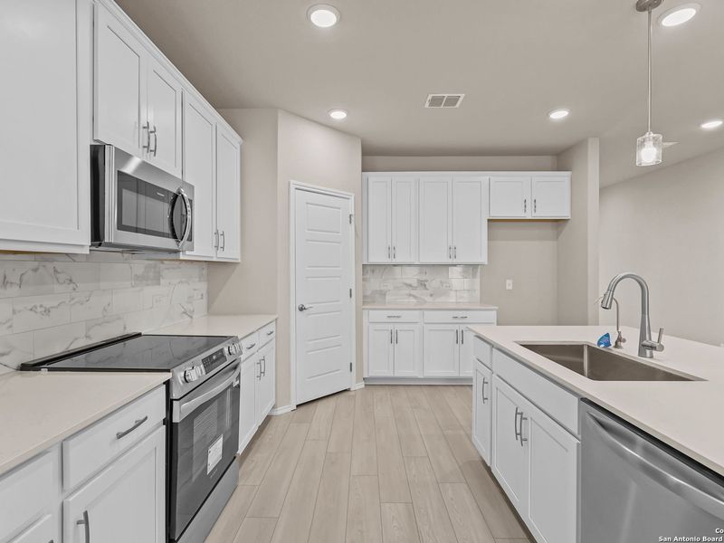 Furnished interior view inside a new home in Royal Crest, San Antonio (Image 10).