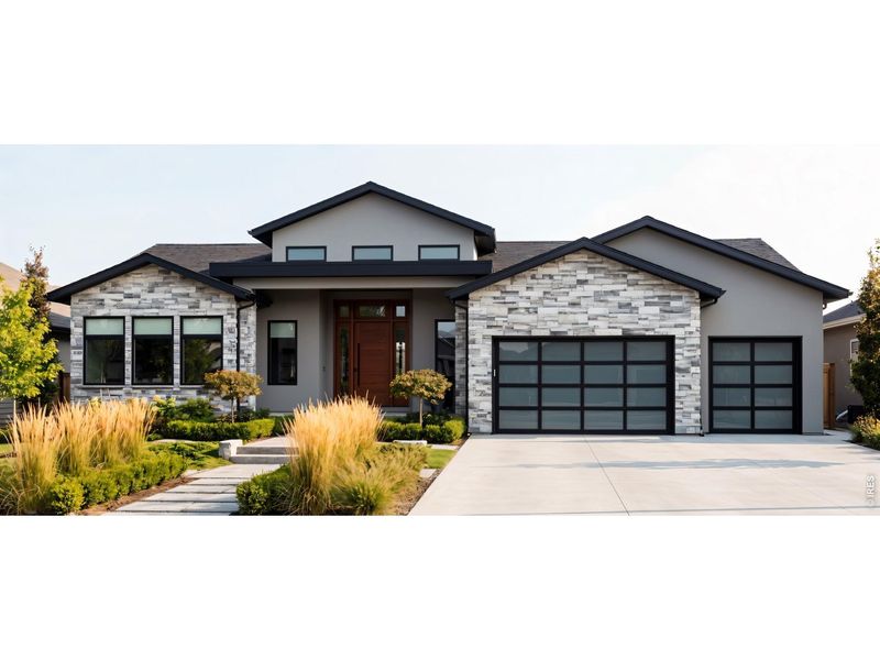 Front exterior of a new home in , Arvada, CO, highlighting curb appeal (Image 1). Front exterior of a new home in , Arvada, CO, highlighting curb appeal (Image 1).