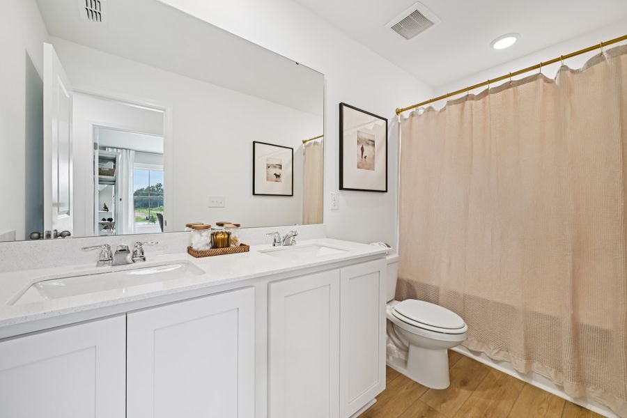 Representative furnished interior of a home built from the Camellia by Ashton Woods in Towns at Crescent Mills, Wilson's Mills (Image 19).