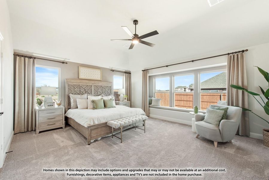 Master bedroom with vaulted ceiling, ceiling fan, window seat, and neutral carpet flooring Master bedroom with vaulted ceiling, ceiling fan, window seat, and neutral carpet flooring