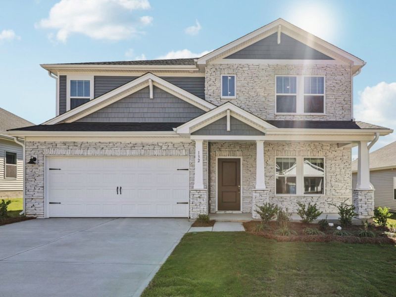 Front exterior of a new home in Oxford Station, Salisbury, NC, highlighting curb appeal (Image 1). Front exterior of a new home in Oxford Station, Salisbury, NC, highlighting curb appeal (Image 1).