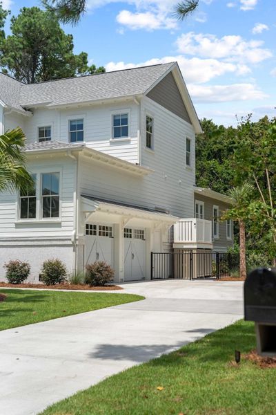 Front exterior of a new home in , Johns Island, SC, highlighting curb appeal (Image 22). Front exterior of a new home in , Johns Island, SC, highlighting curb appeal (Image 22).