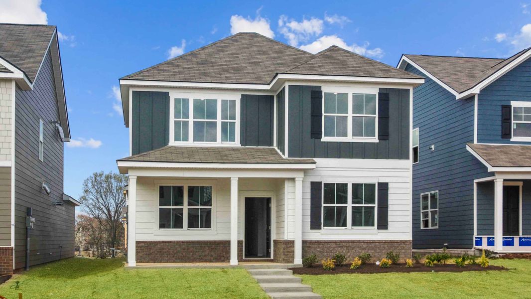 Front exterior of a new home in Reserve at Hickory Ridge, Columbia, TN, highlighting curb appeal (Image 18).