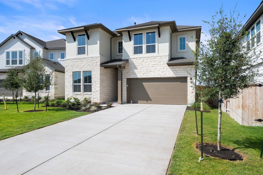 Front exterior of a new home in Park Central, Georgetown, TX, highlighting curb appeal (Image 23).