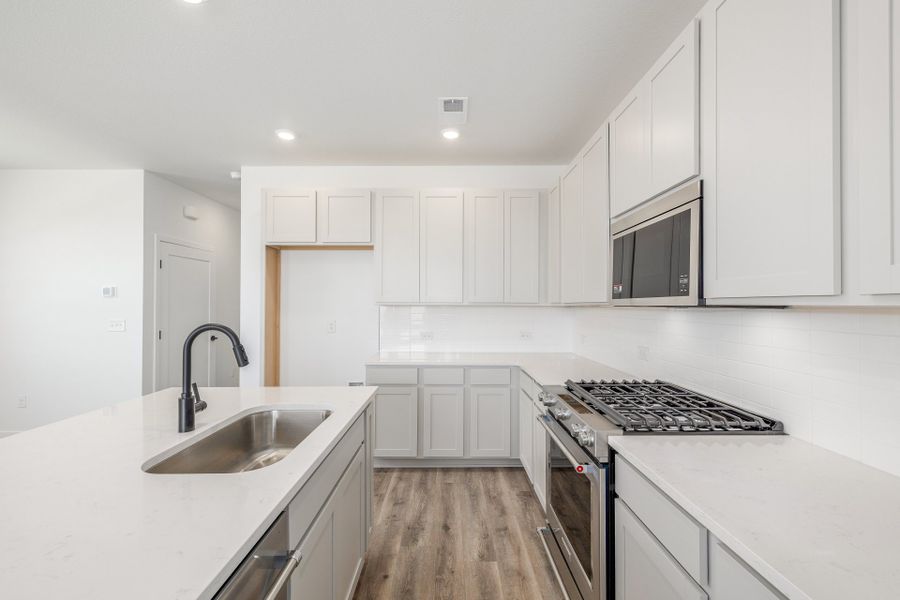 Furnished interior view inside a new home in Painted Prairie, Aurora (Image 9).