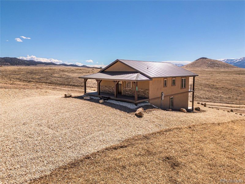 Exterior details and patio area of a home in , Westcliffe (Image 2).