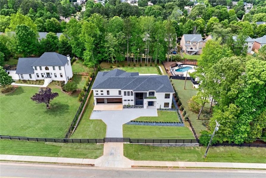 Front exterior of a new home in , Sugar Hill, GA, highlighting curb appeal (Image 27).