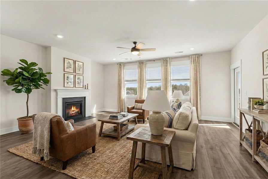 This inviting living room offers abundant natural