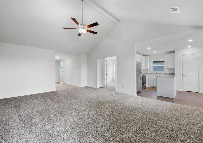 The family room of the Sabine sits adjacent to the kitchen.