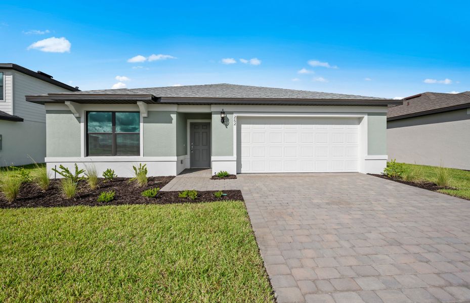 Exterior details and patio area of a home in Whispering Lakes, Lehigh Acres (Image 3).