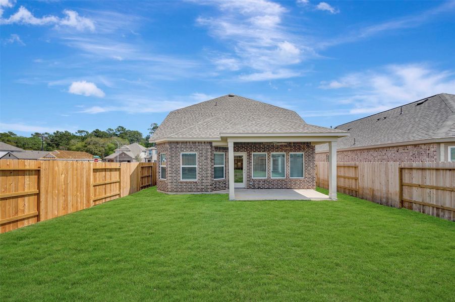 Exterior details and patio area of a home in Sorella, Tomball (Image 22).
