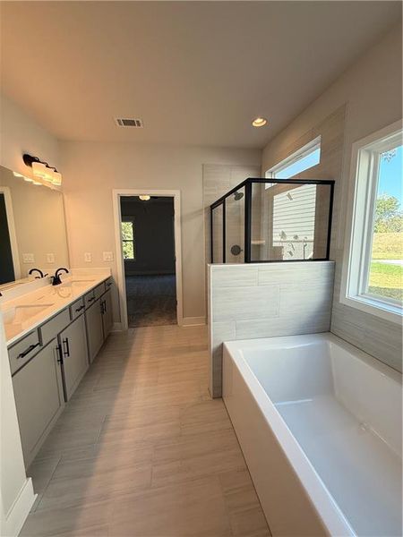 Furnished interior view inside a new home in Fowler Farms, Auburn (Image 10).