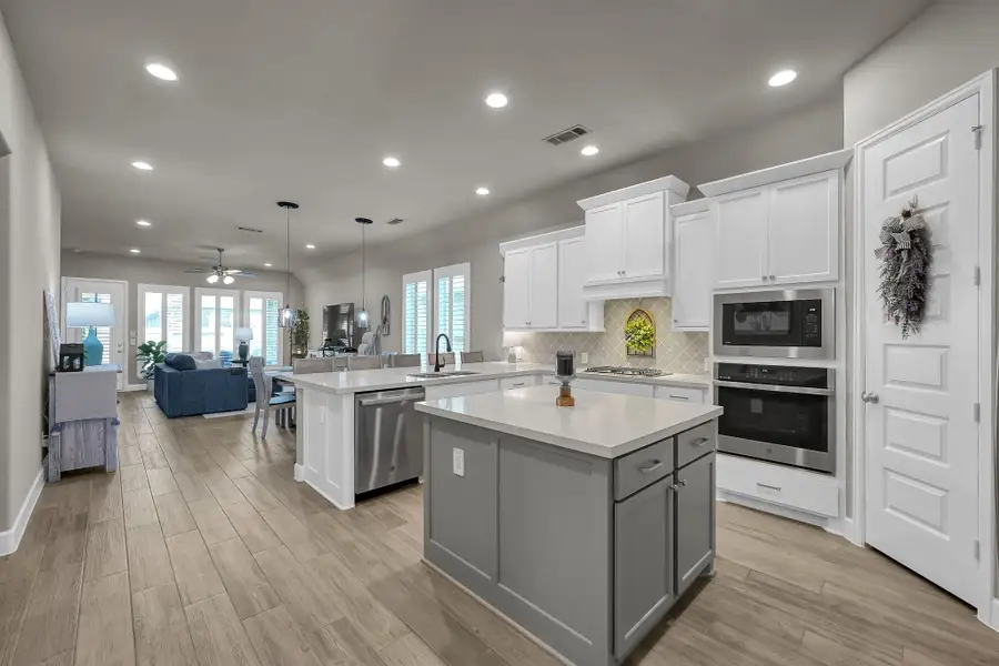 Furnished interior view inside a new home in Grand Central Park 45', Conroe (Image 6).