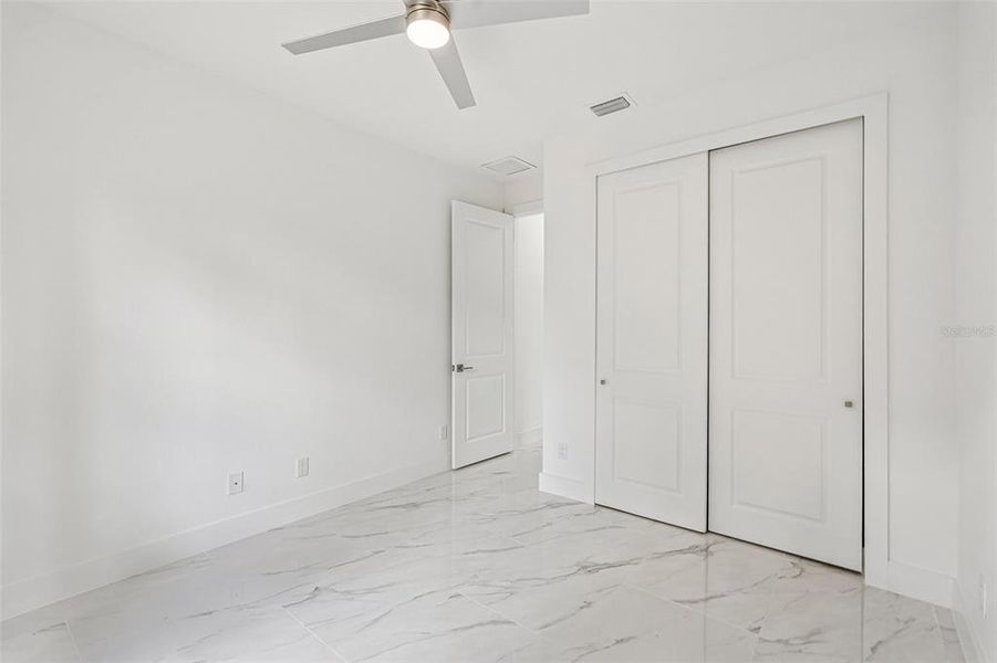 Spacious, unfurnished interior of a new home in , Port Charlotte (Image 33).