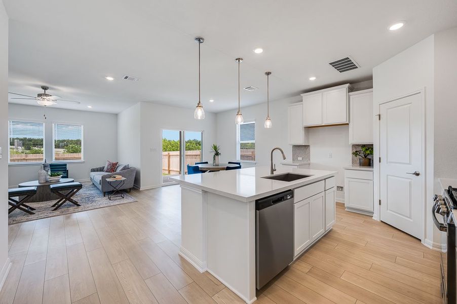 Representative furnished interior of a home built from the Sparrow by Taylor Morrison in Turner's Crossing 50s, Austin (Image 8).