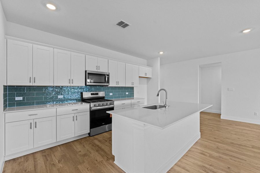 Furnished interior view inside a new home in Railhead, Cedar Creek (Image 7).
