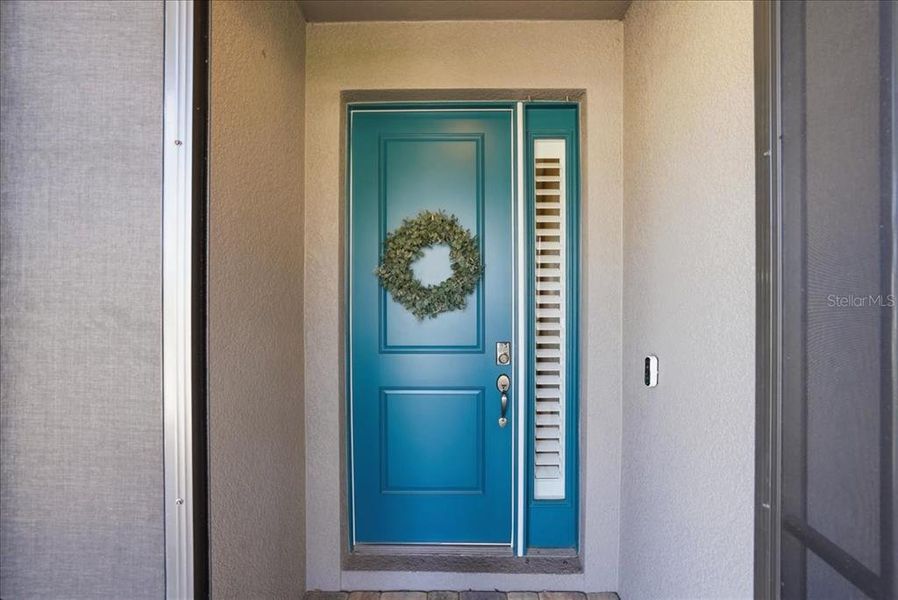 Exterior details and patio area of a home in Cypress Glen at River Wilderness, Parrish (Image 23).