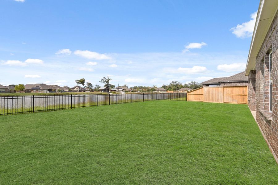 Exterior details and patio area of a home in Woodshore, Clute (Image 3). Exterior details and patio area of a home in Woodshore, Clute (Image 3).