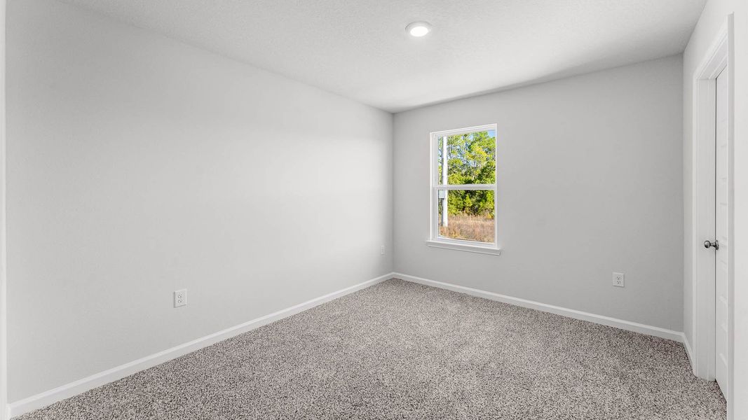 Representative unfurnished interior of a home built from the The Aisle by D.R. Horton in Chateau Nemours, Port Saint Joe (Image 31).