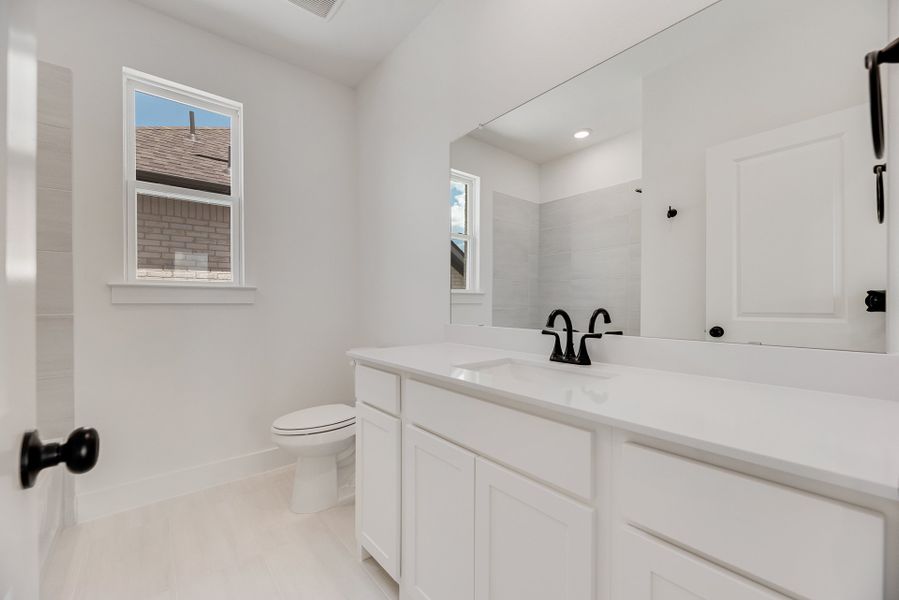 Furnished interior view inside a new home in Cottages of Celina, Celina (Image 9).