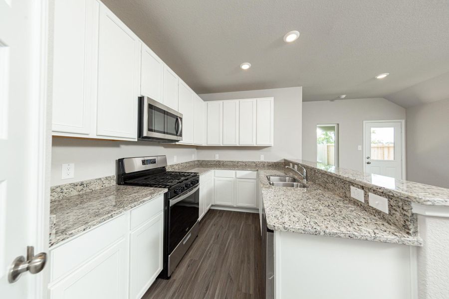 Furnished interior view inside a new home in Cliffstone Hills, Conroe (Image 4).