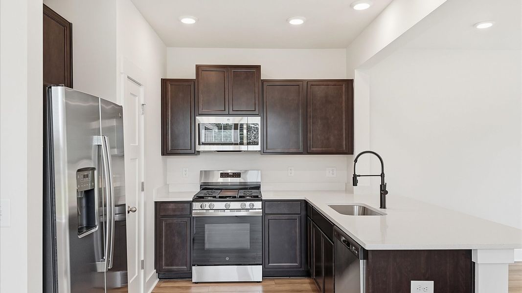 Elegant kitchen with modern finishes in this first-class villa at Clarke Townes near Downtown Anderson, SC